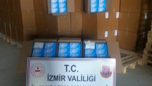 Buca'da büyük operasyon: Milyonlarca cerrahi maske ele geçirildi