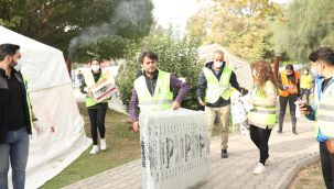 Büyükşehir depremzedelere gelen yardımlar dağıtıyor