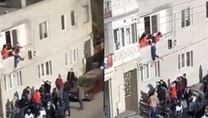 Sinir krizi geçirip penceren atlamaya çalışan kızı babası kurtardı!