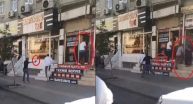 Cadde ortasındaki silahlı çatışma kamerada