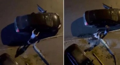Sokak ortasında korkunç olay! Otomobiline binmek isteyen kadını sokakta sürükledi