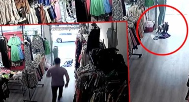 'Hırsız kedi' işbaşında... Mağazadan taytları alan kedi kamerada