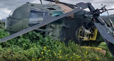 İzmir'de askeri helikopter boş bir araziye zorunlu iniş yaptı: 1 personel yaralandı